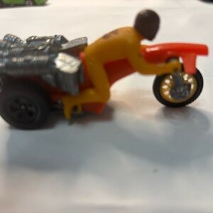 Vibrant Orange and Yellow Toy Motorcycle